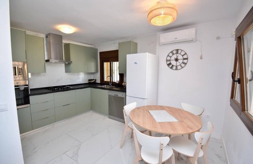 Chiclana de la Frontera Villa | La Casita, rustic has a large garden with swimming pool.