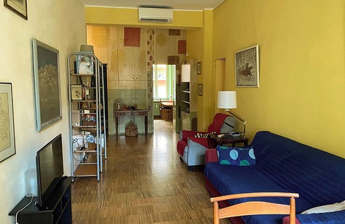Historic Centre Apartment | La casa degli angeli: in the city center apartment decorated by local artists