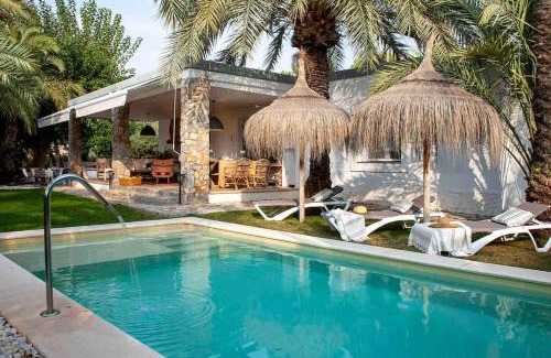 Algoda House | La Casa del Zurdo, oasis de palmeras en Alicante con piscina