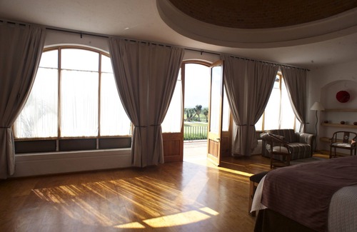 El Pueblito Hotel | La Casona de los Colibríes