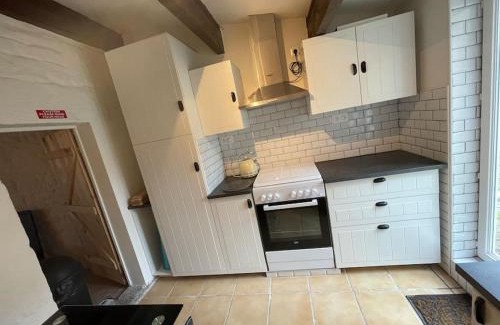 Saint-Michel-de-Montjoie House | La Petit Fleur - the little flower, cosy cottage