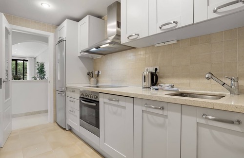 Benahavis Apartment | La Vida Dorada | Apartment with garden