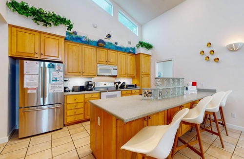 Silver Sands House | Lagoon-front home with dock & soaking bathtub