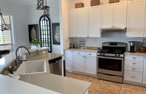 Gulf Shores House | “Lagoonfront Privacy at its Best: Heated Pool, Hot Tub, & Kayaks Included”