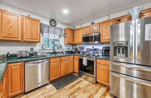 Mineral House | Laid-back lake house with porch, deck, grill, firepit, game room, AC, & W/D