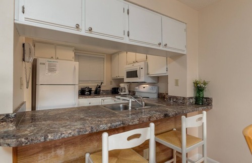 The Dunes Condo | Lake and golf course views pools indoor and out daily rentals welcome