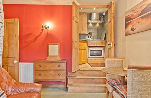 Coniston Apartment | Lake District village apartment with private riverside hot tub