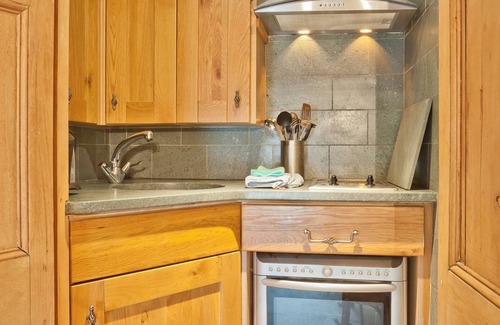 Coniston Apartment | Lake District village apartment with private riverside hot tub