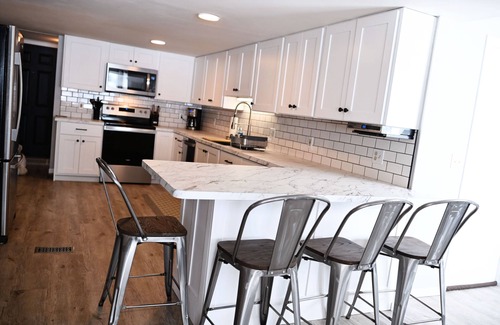 Richwood House | Lake Escape with paddle boards, fire pit & game room