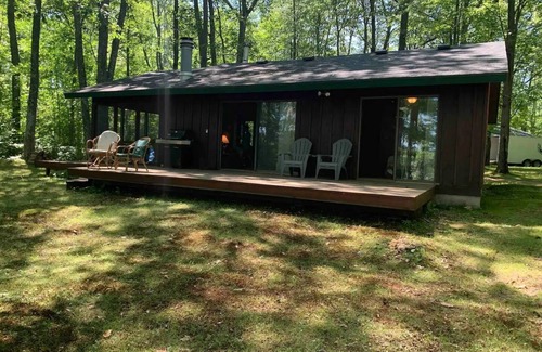 Stone Lake Cottage | Lake Front Cottage Hidden in the Woods with private dock.