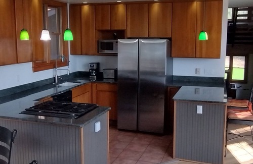Town of Highland House | Lake Front Heated Floors Romantic Hot Tub Firepit Foosball Ski Screen Porch Boat
