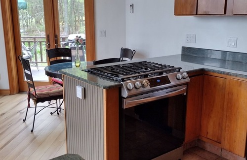 Town of Highland House | Lake Front Heated Floors Romantic Hot Tub Firepit Foosball Ski Screen Porch Boat