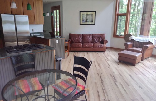 Town of Highland House | Lake Front Heated Floors Romantic Hot Tub Firepit Foosball Ski Screen Porch Boat