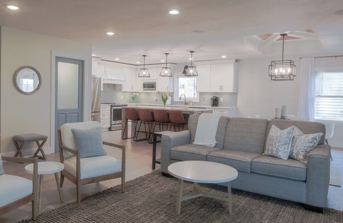 Lowell House | Lake Front Home with open floor plan and amazing back yard accommodates 2 night+