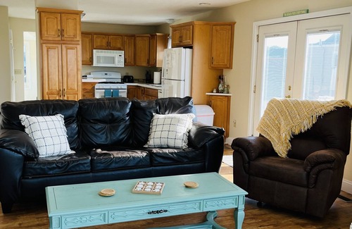 Sea Breeze House | Lake front home with sandy beach!