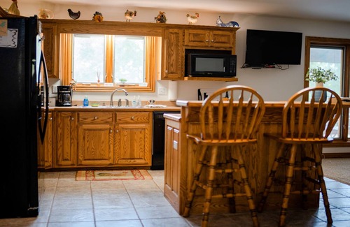 Garfield House | Lake house with washer/dryer, central AC, game rom, deck & yard