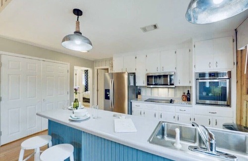 Reed Creek House | Lake toys with calm deep water dock near the widest part of the lake