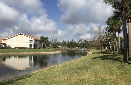 Naples Condo | Lake view - Bright and airy ,end unit Condo-1st Floor-Walk to Pool & Clubhouse