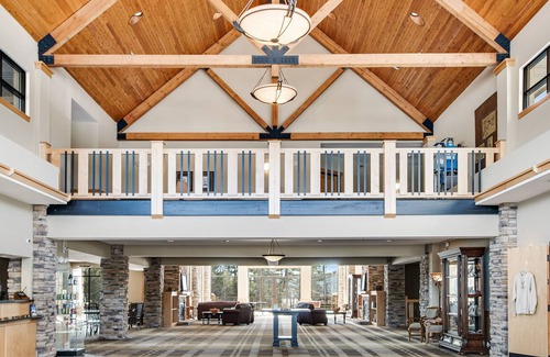 Three Lakes Condo | Lake view condo with 2 balconies, fireplace, pool, hot tubs, gym & sports courts