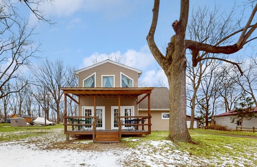 Cayuga House | Lake-view retreat with dock access, firepits, & large yard
