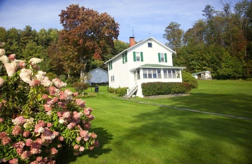 Thompson Cottage | Lakefront 1920's Craftsman on Fiddle Lake - Vacation in Stickley Style