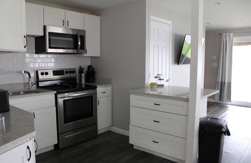 Lochmere House | Lakefront 3 bedroom Duplex on Lake Winnisquam 9-dock and beach Building 1 Unit B