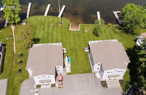 Lochmere House | Lakefront 3-bedroom Duplex on Lake Winnisquam, docks, Beach, WiFi, AC.nB2B