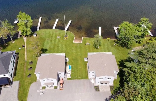 Lochmere House | Lakefront 3-bedroom Duplex on Lake Winnisquam, docks, Beach, WiFi, AC.nB2B