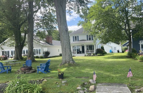 Lakewood House | Lakefront 4 br charming home, huge yard, firepit, & private dock. Walk to shops