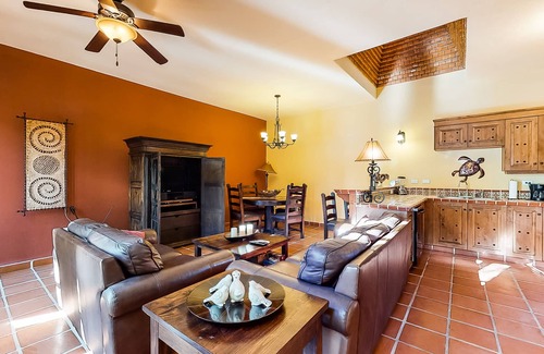 Nopolo House | Lakefront apartment with a terrace, lake/golf views, 3 shared pools, WiFi & AC