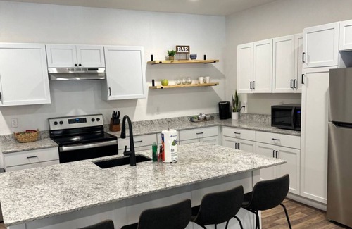 Garfield House | LAKEFRONT Bliss FLAT to water: Spacious home with Game Room, Sleeps 15 Guests!