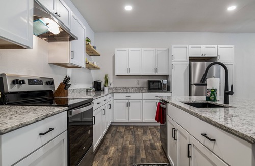 Garfield House | LAKEFRONT Bliss FLAT to water: Spacious home with Game Room, Sleeps 15 Guests!