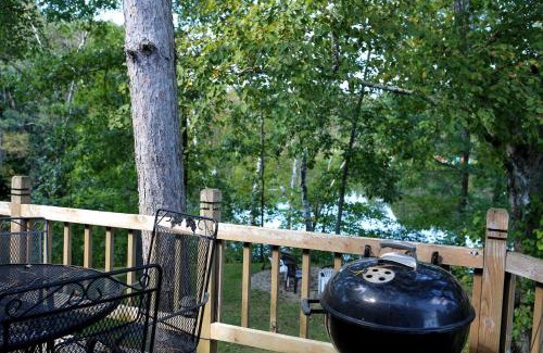 Tomah House | Lakefront Cabin Rental with a Paddle Boat near Wisconsin Dells, Wisconsin