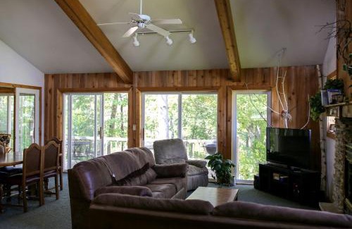 Tomah House | Lakefront Cabin Rental with a Paddle Boat near Wisconsin Dells, Wisconsin