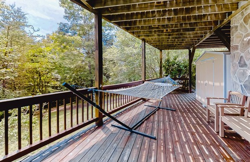 New Tazewell Cabin | Lakefront cabin with private covered dock, lovely deck, lake view & fireplace