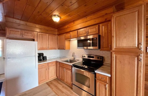 Stevensville House | Lakefront Chalet #16 w/Beach Access, Pools, Sport Courts, Fishing Pond & more!