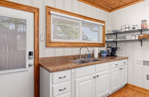 Tuscumbia Cottage | Lakefront Cottage with Boat Slip and Paddleboat