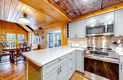 Lac du Flambeau Cottage | Lakefront dog-friendly retreat with sauna, dock, canoe, paddle board, & firepit
