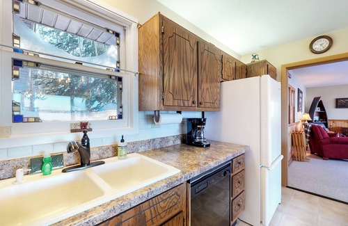 Phelps House | Lakefront, dog-friendly home with beach access, kayaks and firepit