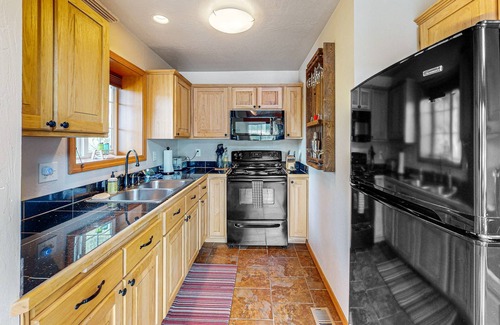 Coeur d'Alene House | Lakefront, dog-friendly home with private dock, swimming beach & firepit