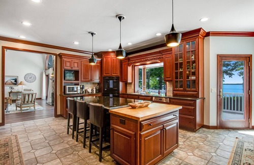 Arkdale House | Lakefront estate with firepit, grill, game room & sauna - near Sand Valley Golf