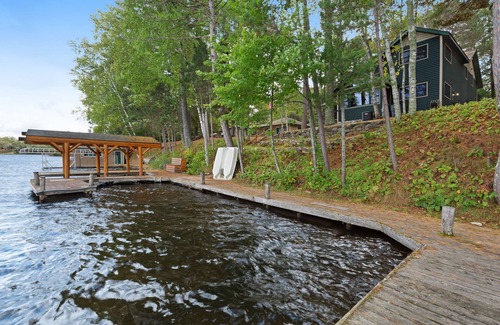 Manitowish Waters Cabin | Lakefront Family Getaway w/Private Dock, Sauna & Bunk House - 1 Dog OK