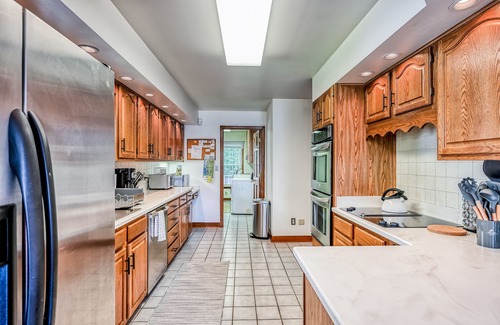 Mineral House | Lakefront home in private location with dock, firepit, game room & Pickleball