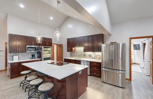 Leesville House | Lakefront home in the woods with dock, den, & private hot tub - dog-friendly