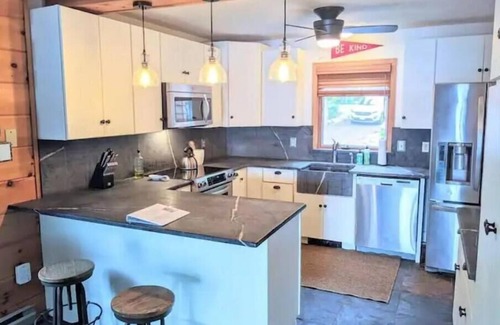 Lake Harmony Estates House | Lakefront home offering private dock, beach, fishing and kayaks for activities.