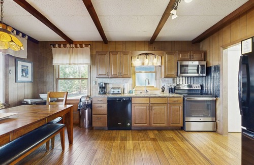 Eagle River House | Lakefront home on private peninsula w/2 piers & lovely water views - 2 dogs OK