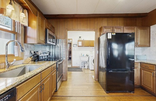 Eagle River House | Lakefront home on private peninsula w/2 piers & lovely water views - 2 dogs OK