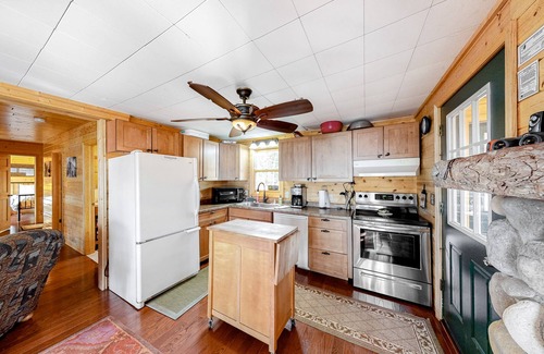 Lac du Flambeau House | Lakefront home with dock, swimming area, & wood stove - sunset views