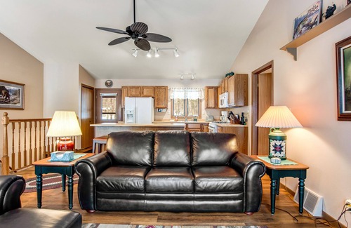 Lac du Flambeau House | Lakefront home with firepit, screened porch, WiFi, central AC, and kayaks