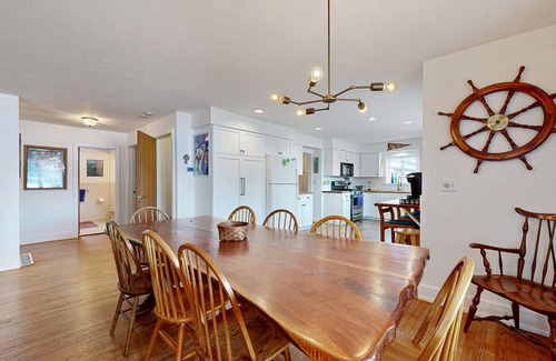 Alden House | Lakefront home w/large yard, sandy beach area, dock, & WIFI, near golf & trails